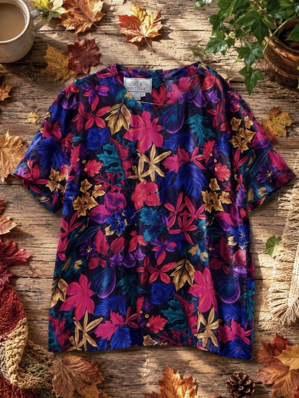 Are you wearing random leaves?  100% silk shell